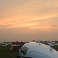 cropped-osh-sunset-over-tail.jpg